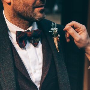 man wearing black suit jacket