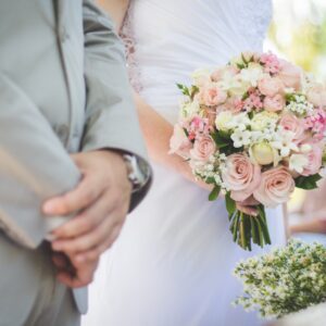 wedding couple standing on the istle